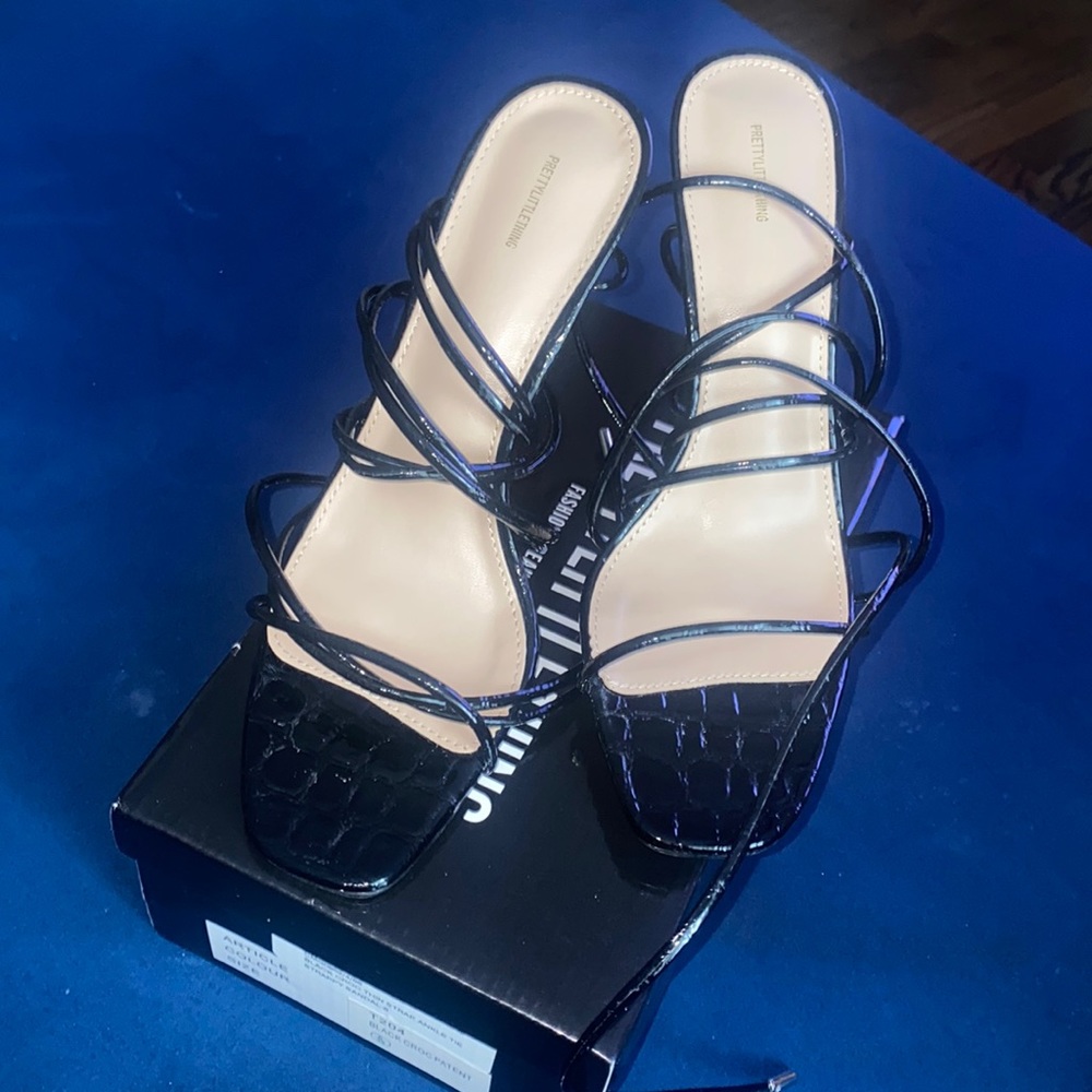Black lace up patent leather heels